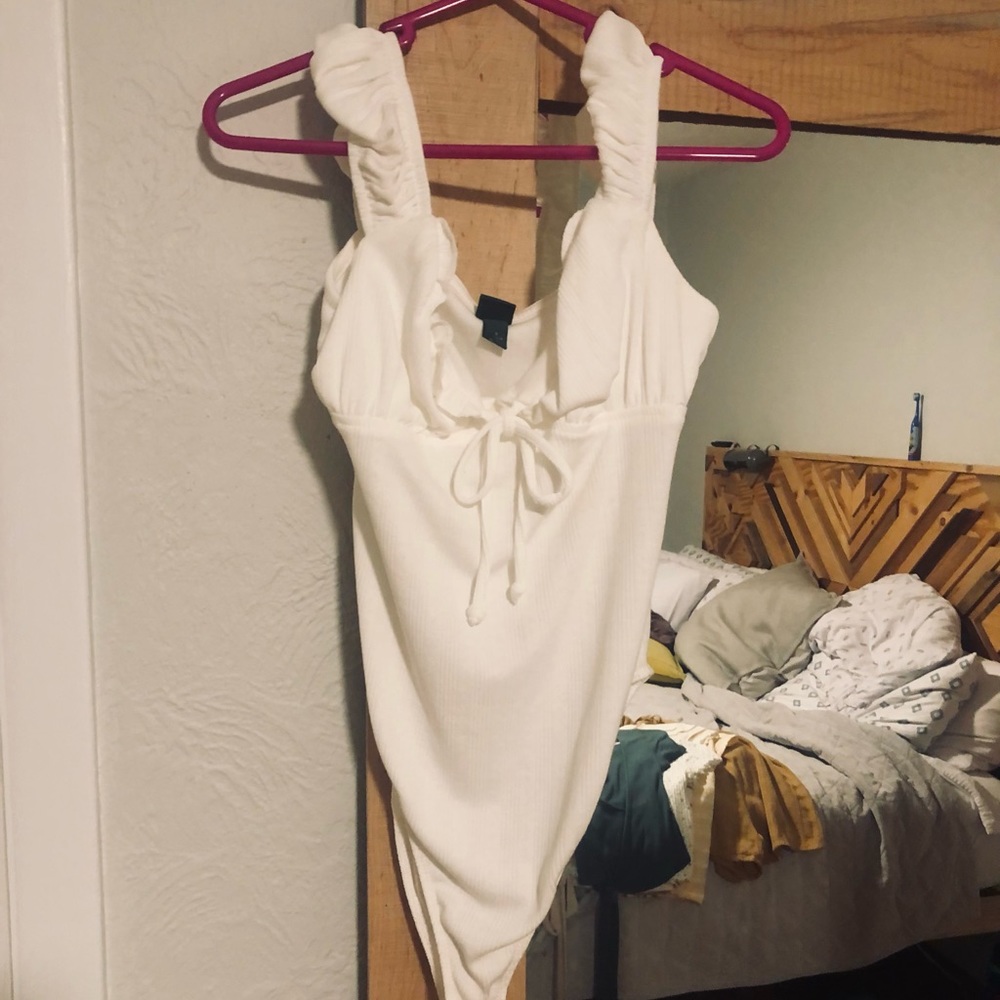 White ruffle bodysuit